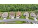 Aerial view of homes in a quiet, tree-lined neighborhood at 9735 Conservation Dr, New Port Richey, FL 34655