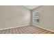 Neutral bedroom featuring carpet, a window, and plenty of electric outlets at 9735 Conservation Dr, New Port Richey, FL 34655