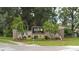 Timber Greens Oak Pine Village entrance sign at 9735 Conservation Dr, New Port Richey, FL 34655