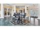 Elegant lobby featuring a grand piano, marble floors, and ornate details at 9735 Conservation Dr, New Port Richey, FL 34655