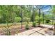 Screened in patio featuring a brick floor with a view of the backyard at 9735 Conservation Dr, New Port Richey, FL 34655