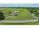 Aerial view of the home and surrounding land, showcasing its convenient location and proximity to amenities at 9780 Allen Rd, Lithia, FL 33547
