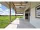 Outdoor barn area featuring an open view of the surrounding landscape and multiple ceiling fans at 9780 Allen Rd, Lithia, FL 33547