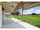 Open patio area offering clear views of the surrounding pasture and plenty of space for recreation at 9780 Allen Rd, Lithia, FL 33547
