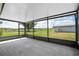 Spacious screened-in patio with views of the surrounding landscape at 9780 Allen Rd, Lithia, FL 33547