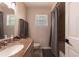Bathroom with granite sink and tiled shower/tub combo at 3254 Great Neck St, Port Charlotte, FL 33952