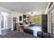 Spacious living room featuring wood floors, neutral colors, comfortable seating, and natural light at 3254 Great Neck St, Port Charlotte, FL 33952