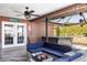 Outdoor covered patio with wicker furniture and a hot tub at 3254 Great Neck St, Port Charlotte, FL 33952