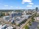 The aerial shot highlights the city skyline and the strategic location of the property near major roads and amenities at 1010 Central Ave # 227, St Petersburg, FL 33705