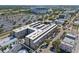 Captivating aerial view showcasing the buildings location near the stadium with nearby amenities, and stunning cityscape views at 1010 Central Ave # 227, St Petersburg, FL 33705