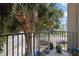 Relaxing balcony with charming plants and views of the lively street, offering a perfect spot to unwind at 1010 Central Ave # 227, St Petersburg, FL 33705