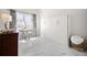 Comfortable bedroom with modern murphy bed, marble floors, and stylish decor at 1010 Central Ave # 227, St Petersburg, FL 33705