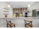 Modern kitchen with marble countertops, stainless steel appliances, and stylish bar seating, perfect for cooking and entertaining at 1010 Central Ave # 227, St Petersburg, FL 33705