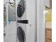 Convenient stacked washer and dryer laundry setup, perfect for saving space in your home at 1010 Central Ave # 227, St Petersburg, FL 33705