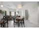 Bright living area with stylish furniture, green patterned curtains, and a view from the balcony for relaxation and comfort at 1010 Central Ave # 227, St Petersburg, FL 33705
