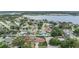 Aerial view of the neighborhood, highlighting the home's proximity to the water and the beautiful lakefront community at 10954 96Th St, Largo, FL 33773