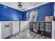 Unique bedroom with Tampa Bay Lightning decor, including hockey sticks and team flag at 10954 96Th St, Largo, FL 33773