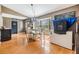 Well-lit dining room featuring a chandelier and bay window for natural light at 10954 96Th St, Largo, FL 33773