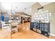 Open dining room with chandelier lighting and views to the kitchen and living areas at 10954 96Th St, Largo, FL 33773