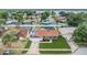Well-maintained home boasts a manicured lawn and fresh landscaping in a desirable neighborhood near the water at 10954 96Th St, Largo, FL 33773