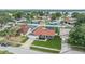 Charming single-story home features a new green lawn and a garage with modern updates in a suburban neighborhood at 10954 96Th St, Largo, FL 33773