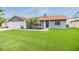 Beautiful home with well-maintained front yard and two-car garage at 10954 96Th St, Largo, FL 33773