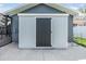 Exterior view of a matching utility shed, perfect for extra storage at 10954 96Th St, Largo, FL 33773