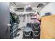 Walk-in closet with shelving and storage solutions at 10954 96Th St, Largo, FL 33773