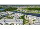 Stunning aerial view of the property showcasing its prime waterfront location on the canal with neighborhood view at 110 Aberdeen Pond Dr, Apollo Beach, FL 33572