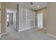 Spacious bedroom with carpet flooring, white trim, and a window with shutter accents at 110 Aberdeen Pond Dr, Apollo Beach, FL 33572