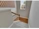 Carpeted staircase leading to the upper level, showcasing the home's interior design at 110 Aberdeen Pond Dr, Apollo Beach, FL 33572