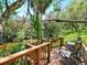 Enjoy the nature scenery from the backyard deck next to the creek at 1141 Myrtle Rd, Valrico, FL 33596
