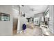 Open-concept bathroom featuring a soaking tub, tiled shower, double sinks, and plenty of counter space at 1141 Myrtle Rd, Valrico, FL 33596