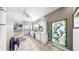 Elegant bathroom boasting double sinks, a soaking tub, and a decorative stained glass window at 1141 Myrtle Rd, Valrico, FL 33596