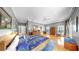 Bright and airy main bedroom with hardwood floors, a ceiling fan, and plenty of natural light at 1141 Myrtle Rd, Valrico, FL 33596