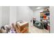 Bright storage area with tile floors, shelving, and space for organizing belongings at 1141 Myrtle Rd, Valrico, FL 33596