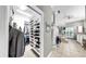 Large walk-in closet with custom shelving and plenty of room for storage at 1141 Myrtle Rd, Valrico, FL 33596
