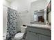 Spotless bathroom with a walk-in shower and granite countertops at 12401 Shining Willow St, Riverview, FL 33579