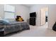 Cozy bedroom featuring a comfortable bed, stylish decor, and plenty of natural light at 12401 Shining Willow St, Riverview, FL 33579