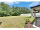 Large backyard with a privacy fence and lush greenery. Perfect for outdoor activities at 12617 Maple Bonsai Dr, Riverview, FL 33579