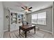 Study Room with built-in shelves, a comfortable desk, and a ceiling fan at 12617 Maple Bonsai Dr, Riverview, FL 33579