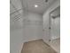 Spacious walk-in closet with wire shelving, providing ample storage space at 12617 Maple Bonsai Dr, Riverview, FL 33579