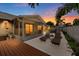 An outdoor screened patio with lounge chairs ideal for enjoying quiet evenings with beautiful sunsets at 12804 Bert Pl, Tampa, FL 33625