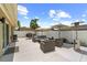 Spacious backyard featuring comfortable outdoor seating, ideal for socializing in the outdoor air at 12804 Bert Pl, Tampa, FL 33625