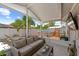 Enjoy relaxing on a large comfortable outdoor patio with view of the above ground pool at 12804 Bert Pl, Tampa, FL 33625