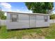 Exterior view of a utility shed in the backyard, offering extra storage space at 12804 Bert Pl, Tampa, FL 33625