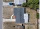 An aerial view of a house with dark roof, a light colored walkway, and vehicle parked in the driveway at 12901 College Hill Dr, Hudson, FL 34667