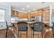 Elegant kitchen featuring granite counters, stainless steel appliances, and wooden cabinetry at 13028 Prestwick Dr, Riverview, FL 33579