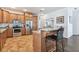 Beautiful kitchen with granite countertops, stainless steel appliances, and a breakfast bar at 13028 Prestwick Dr, Riverview, FL 33579