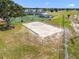 Volleyball sand court adjacent to tennis courts and park in community at 13028 Prestwick Dr, Riverview, FL 33579